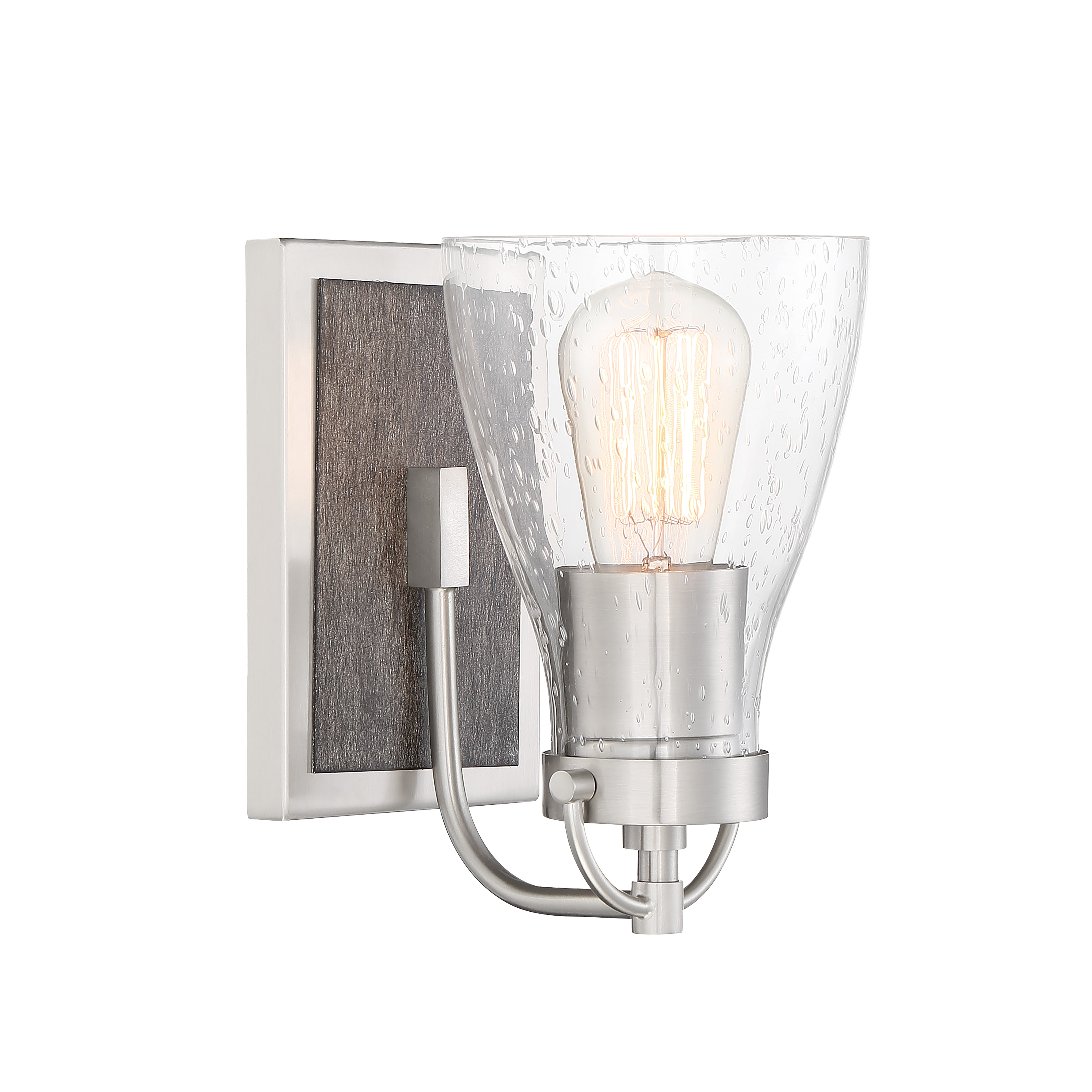 The Garrison bath light blends brushed nickel with natural shale wood for a contemporary look with organic warmth. Its seeded glass shade adds texture while the compact 5.25" width fits smaller vanity spaces perfectly.