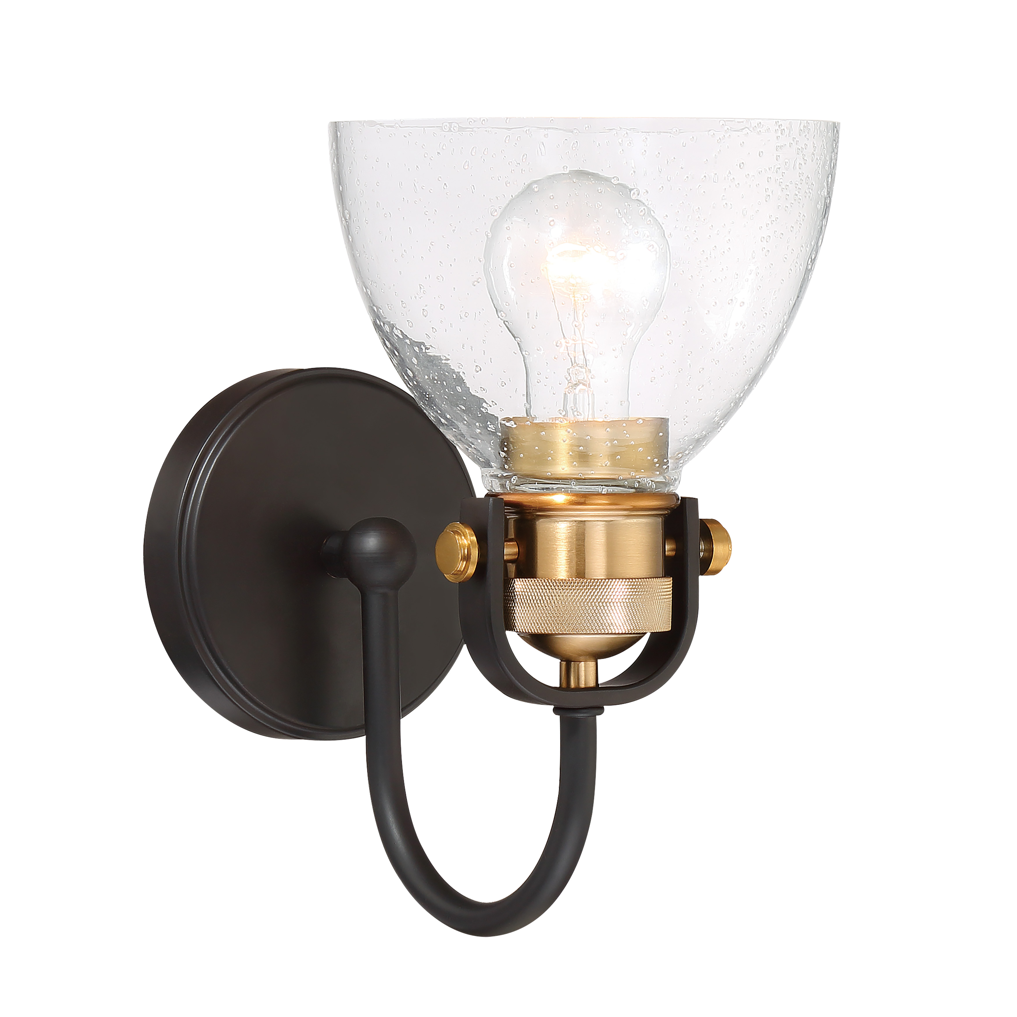 The Monico bath light blends traditional warmth with contemporary simplicity. Its bronze and brass finish paired with clear seeded glass creates subtle vintage character perfect for transitional bathrooms.