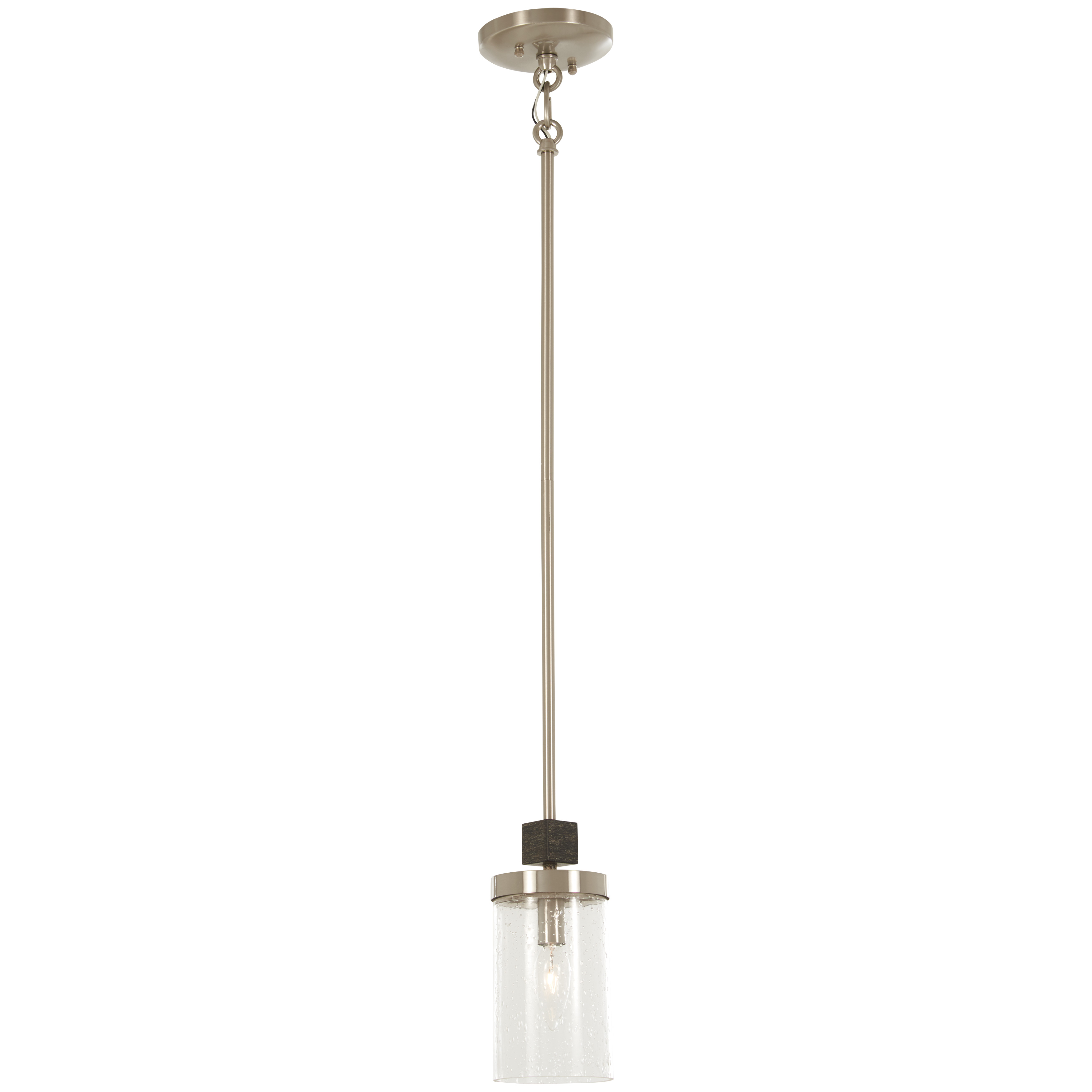 The Bridlewood mini pendant combines stone grey and brushed nickel finishes with clear seeded glass for a versatile transitional look. Its compact 4-inch width makes it perfect for smaller spaces or grouped installations.