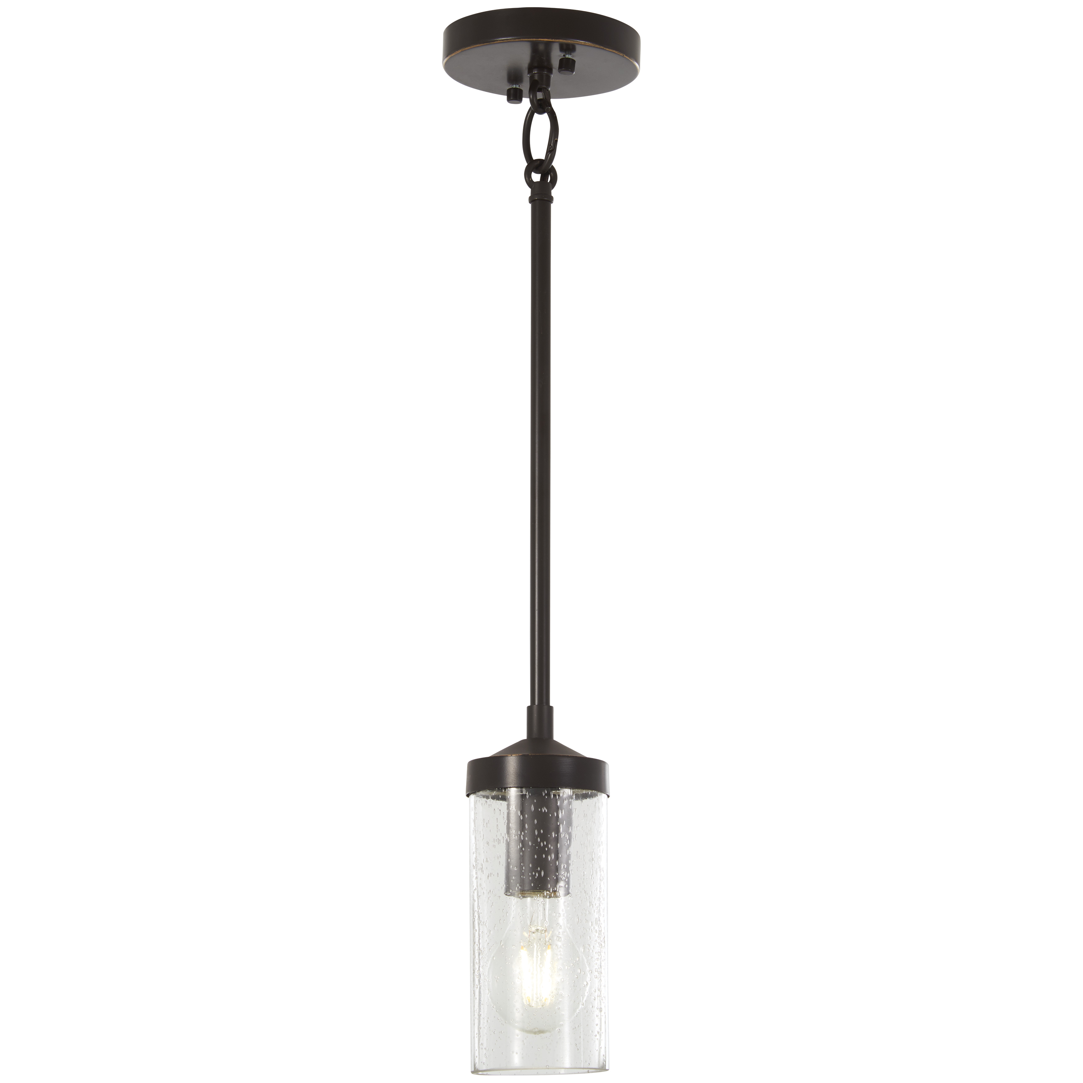 The Elyton mini pendant combines downtown bronze with gold highlights and clear seeded glass for a refined transitional look. Its compact 3.4-inch diameter makes it ideal for task lighting or clustered installations.