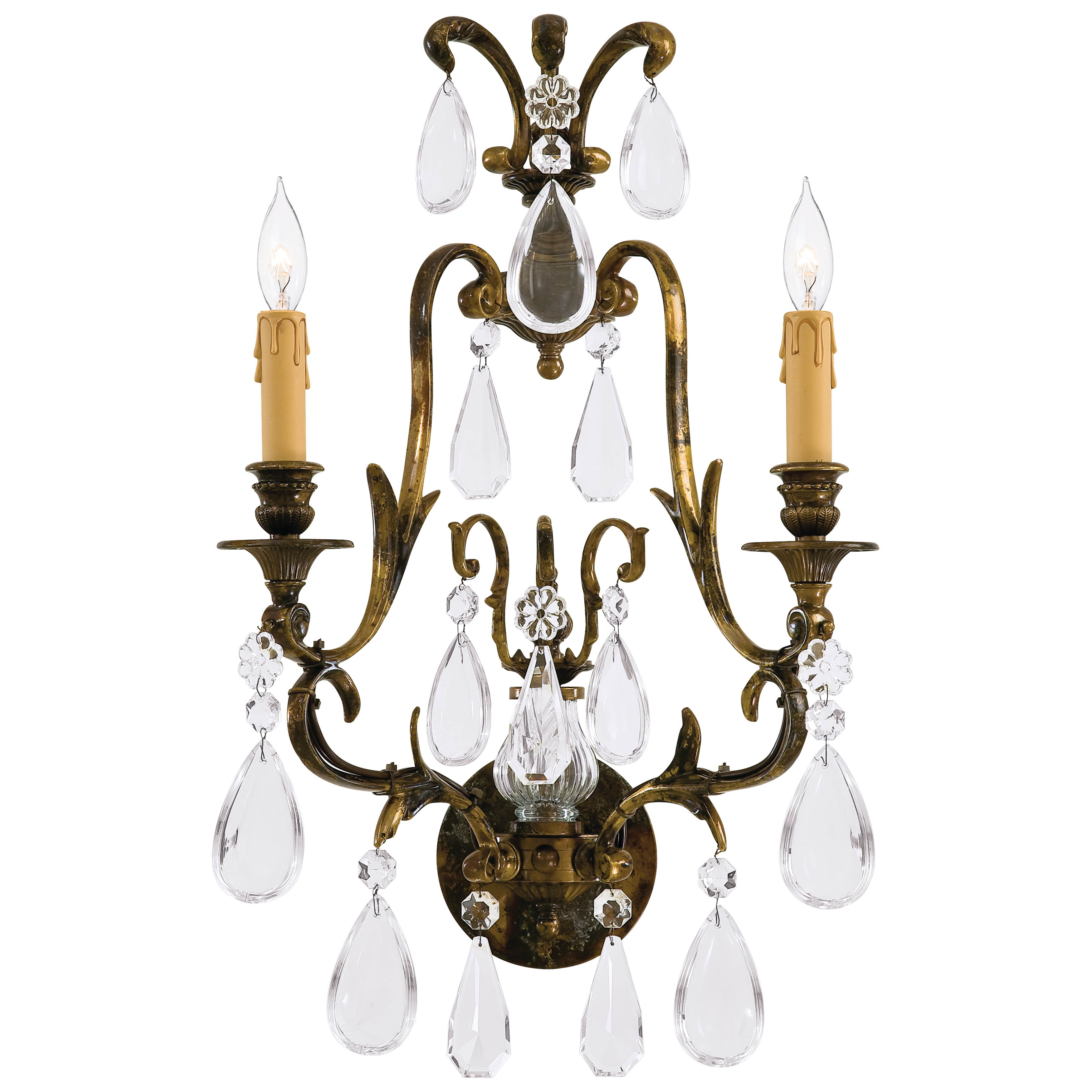 This exquisite wall sconce combines Old World craftsmanship with transitional design. Handcrafted in Italy with solid cast construction and oxidized brass finish, it features authentic Bohemian crystals that add refined sparkle to any space.